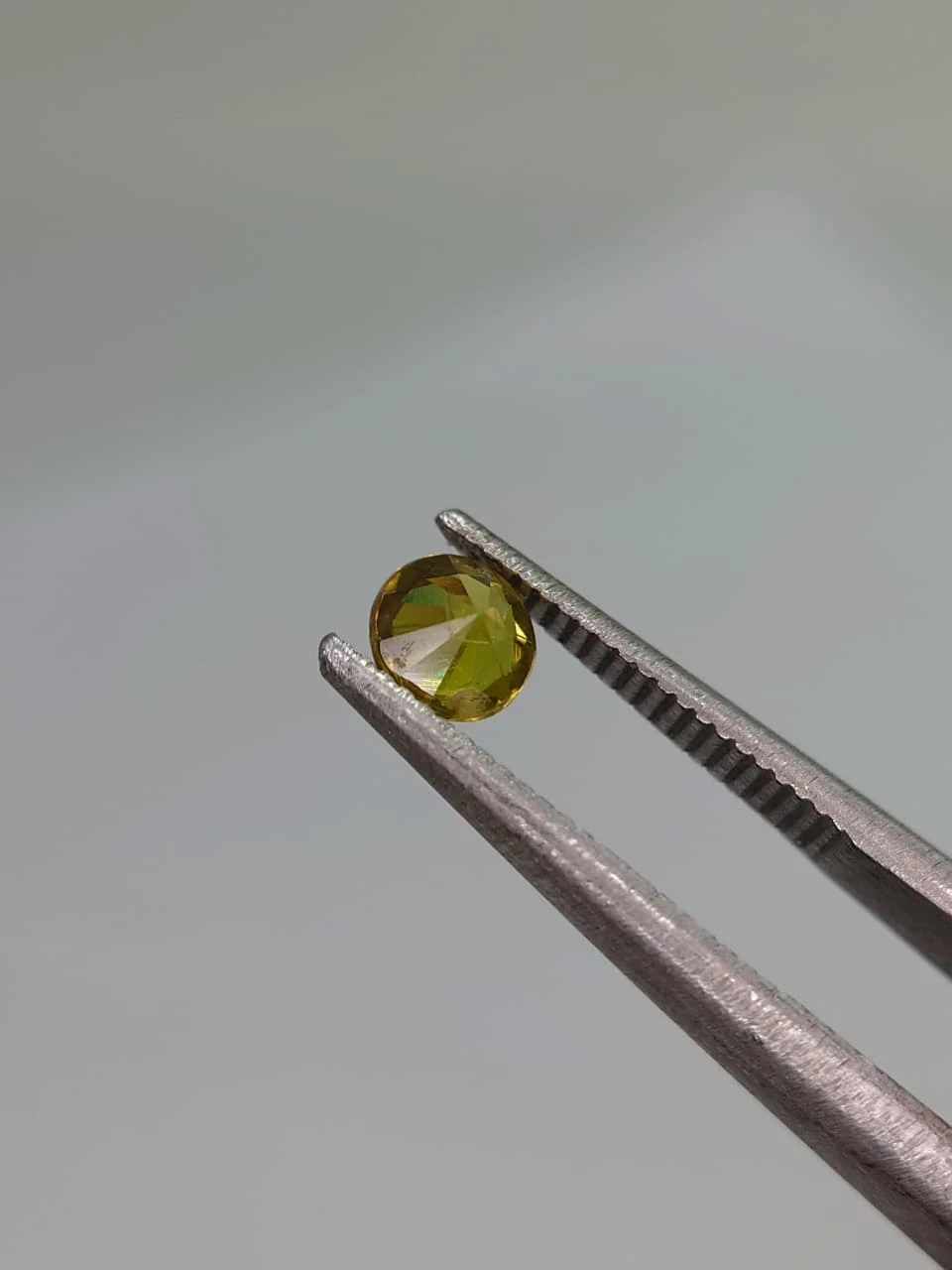 0.35ct Natural Brilliant Round Faceted Demantoid Garnet from Pakistan — view 3